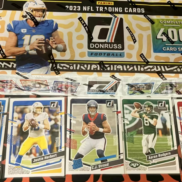 2023 NFL Trading Cards display with Justin Herbert, C.J. Stroud, and Aaron Rodgers cards shown